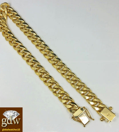 Real 10k yellow Gold Miami Cuban Bracelet 9" Inch 7mm Box Lock Unisex - Reva Jeweler