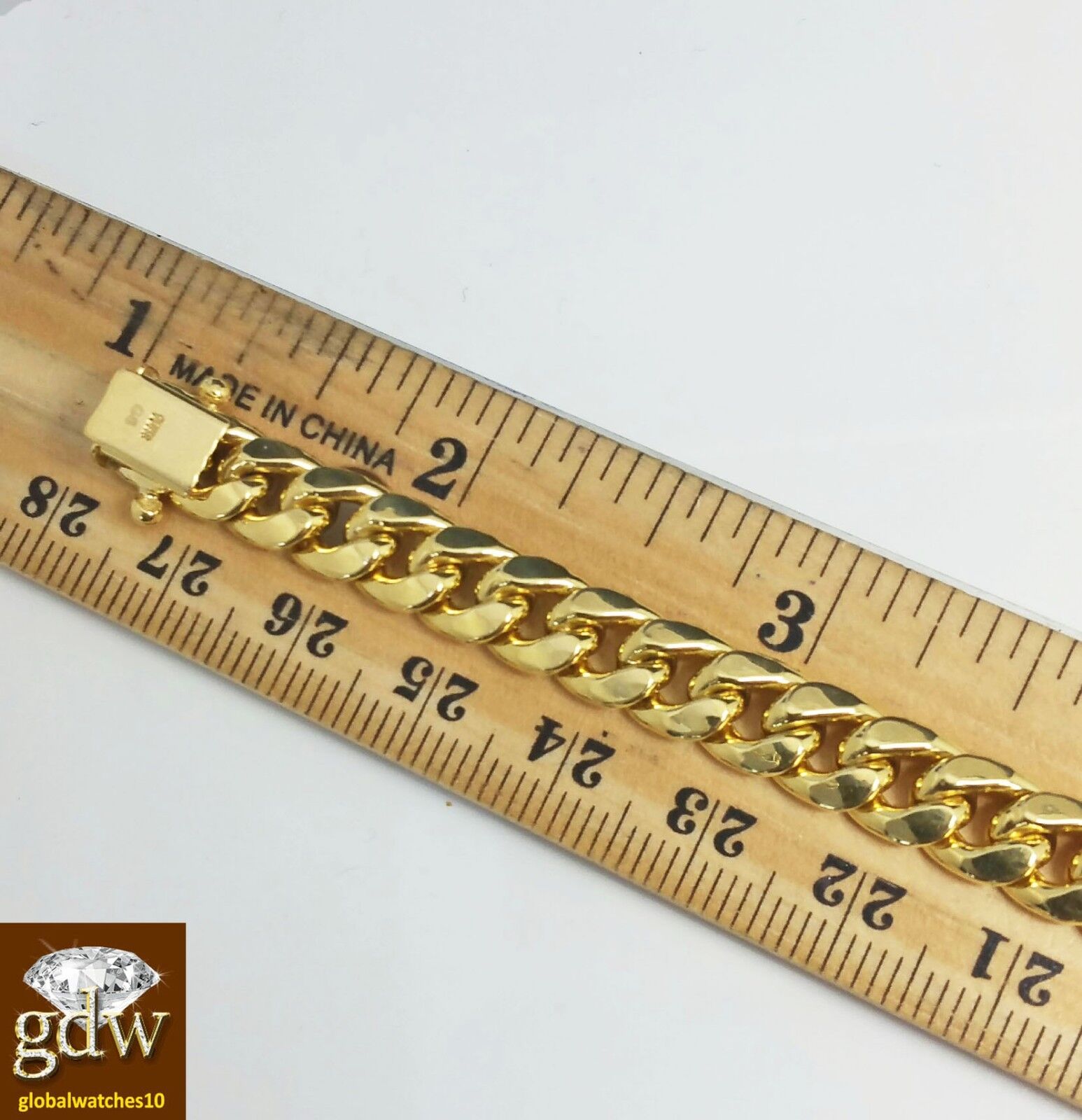 Real 10k yellow Gold Miami Cuban Bracelet 9" Inch 7mm Box Lock Unisex - Reva Jeweler