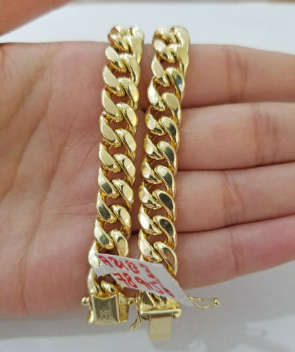 REAL 14k Gold Miami Cuban Bracelet 7" 9mm 14 kt Yellow Gold Strong Links LADIES - Reva Jeweler